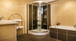 Bathtub, hair dryer, towels