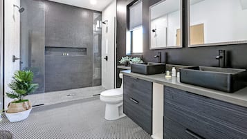 Bathtub, hair dryer, towels, soap