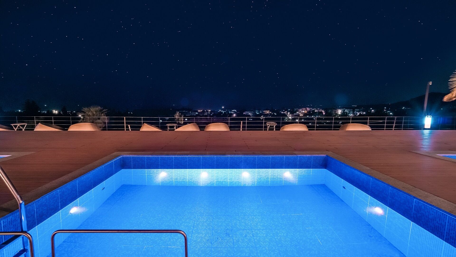 outdoor pool, open 11:00 am to 11:00 pm, pool umbrellas, pool loungers