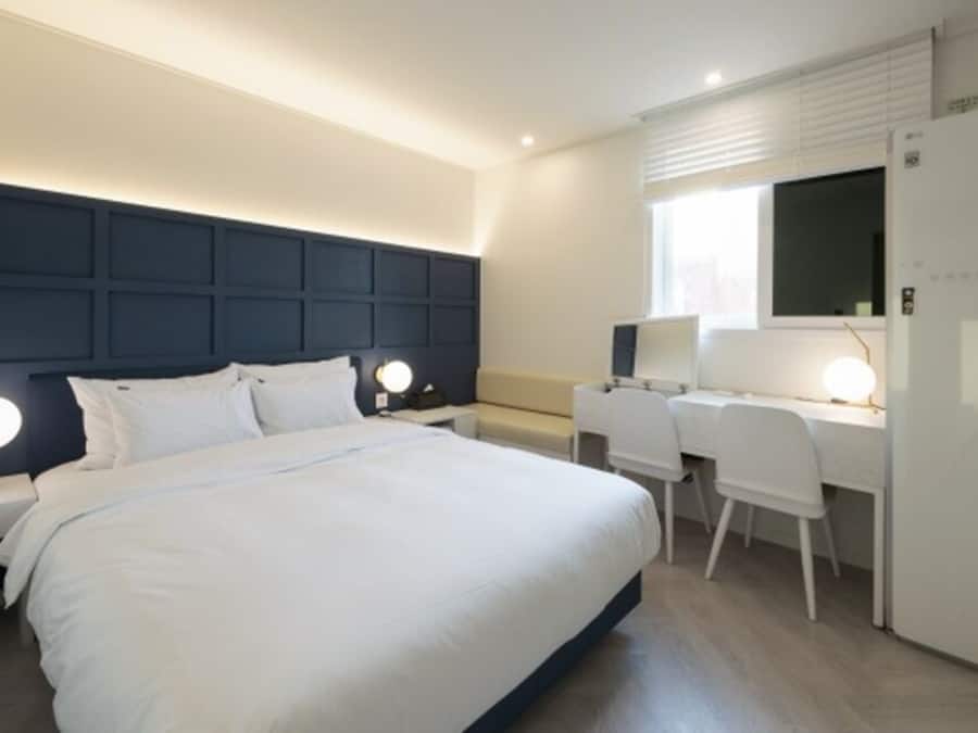 Rom – premium (Styler) | Dundyner, individuelt dekorert og individuelt innredet