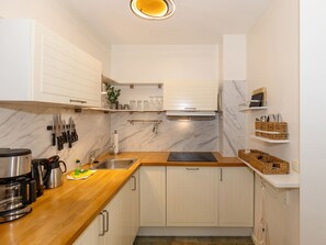 Fridge, dishwasher, coffee/tea maker, electric kettle