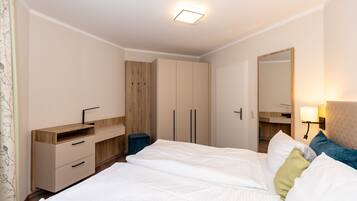 2 chambres, coffres-forts dans les chambres, Wi-Fi, draps fournis