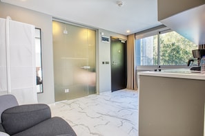 Suite superior, baño privado | Cocina privada | Frigobar 