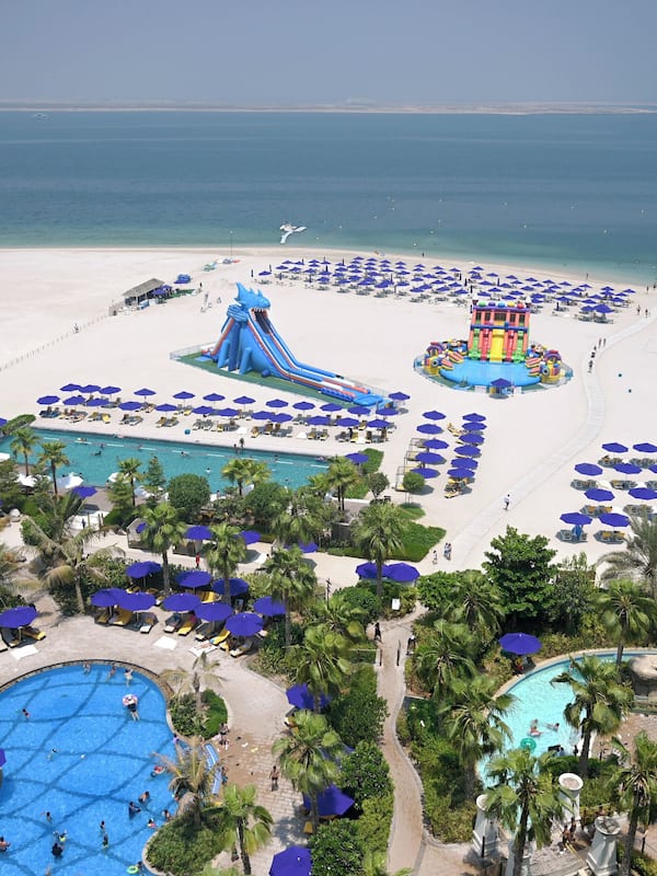 On the beach, beach cabanas, sun loungers, beach umbrellas