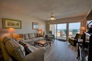 TV, fireplace - "Queens Grant B-106" Oceanfront Condo w/ Community Pool and Day Docks (Topsail Beach)
