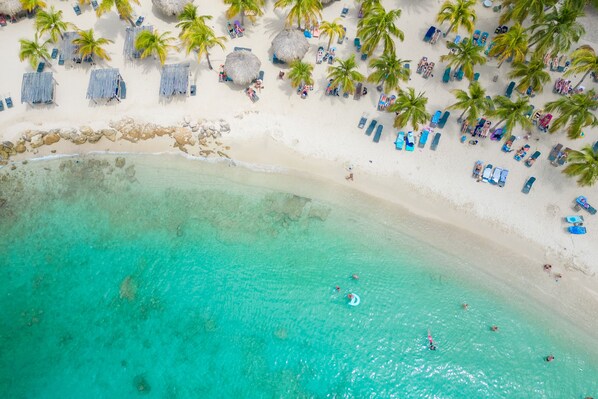 On the beach, sun-loungers, beach towels