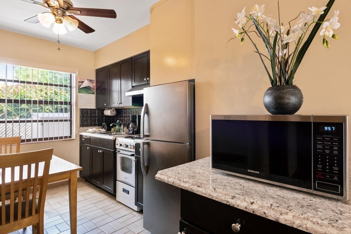 superior studio, pool view | private kitchen | fridge