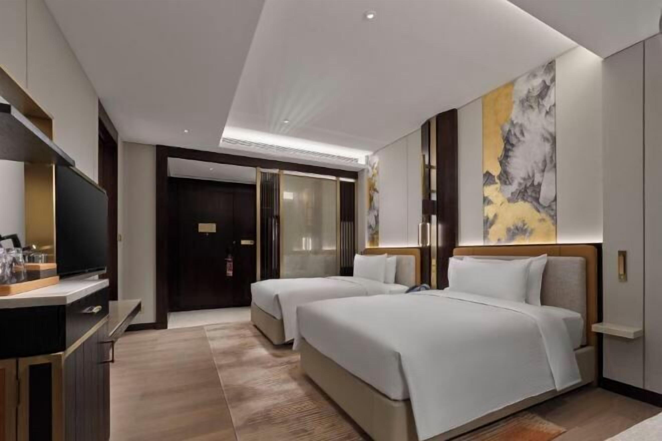Ropa de cama de alta calidad, camas Select Comfort y minibar 