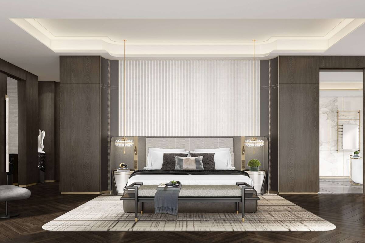 Une chambre moderne avec un grand lit, des tables de chevet, un bureau et une chaise.
