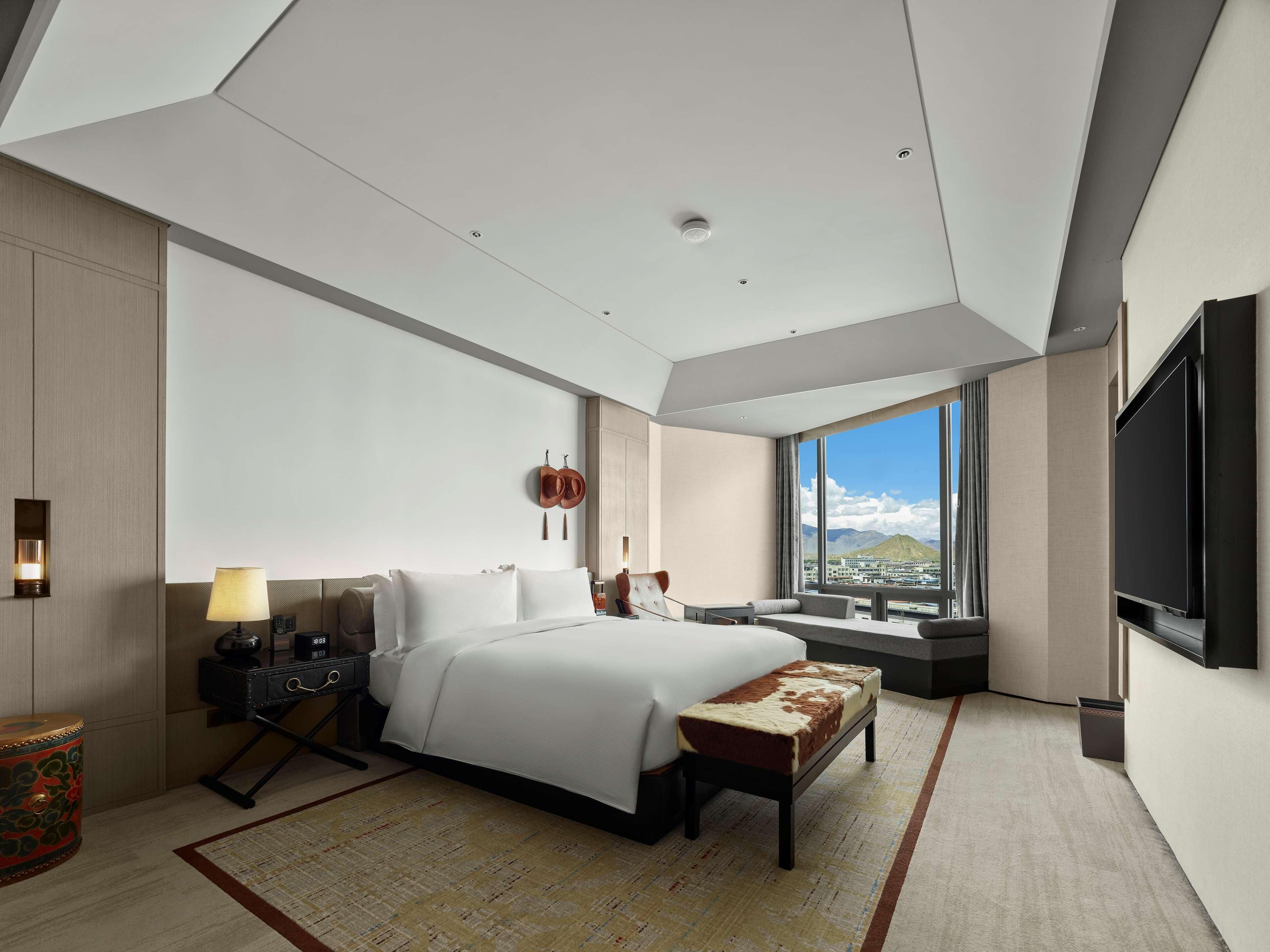 Ropa de cama de alta calidad, edredón y minibar 
