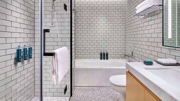 Combined shower/tub, designer toiletries, hair dryer, bathrobes