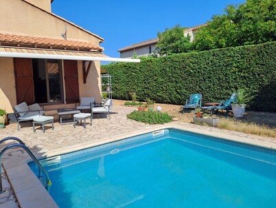 Villa by the sea, swimming pool in a quiet green setting