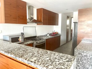 Fridge, microwave, oven, cookware/dishes/utensils