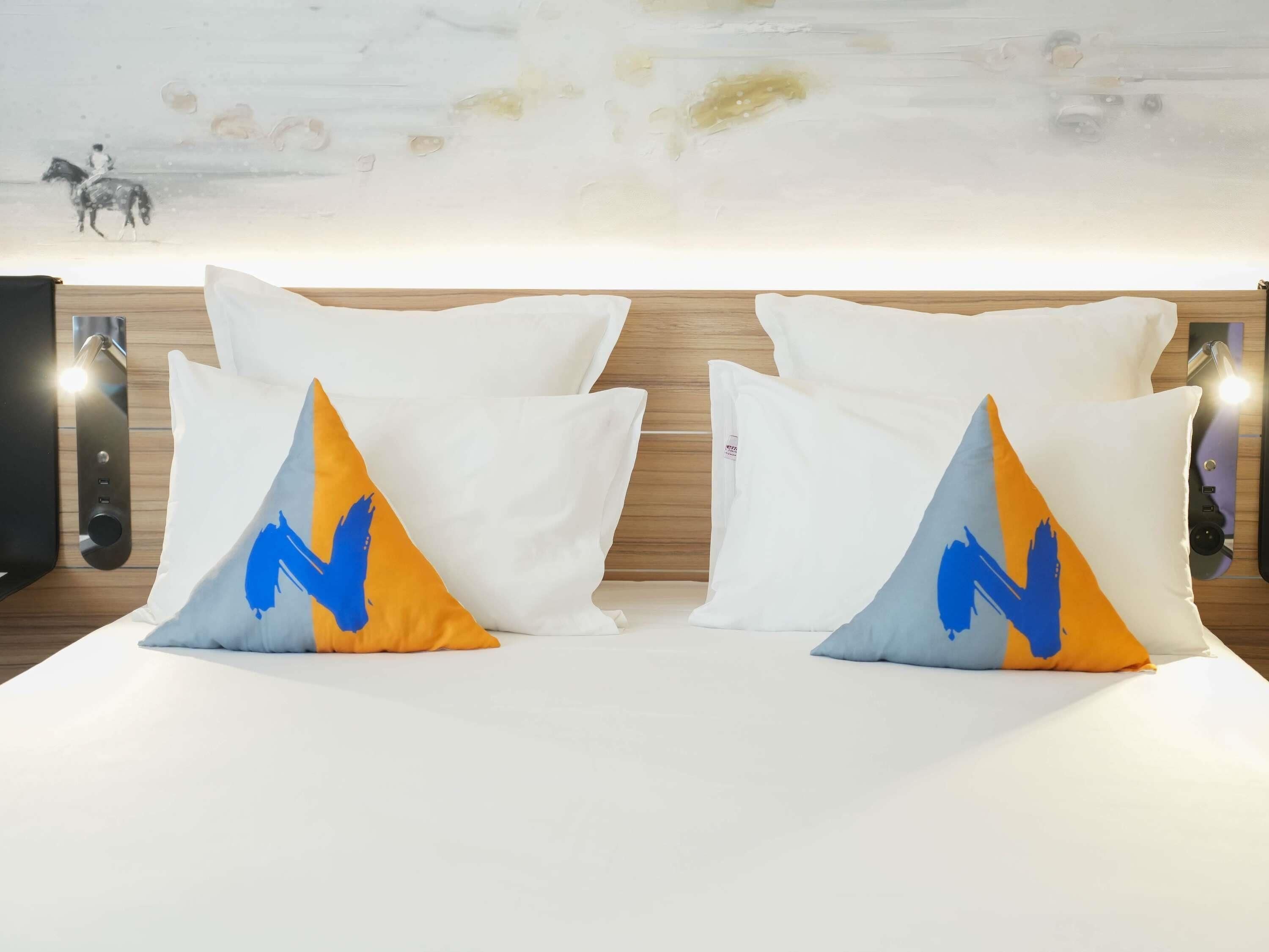 Hypo-allergenic bedding, minibar, in-room safe, desk