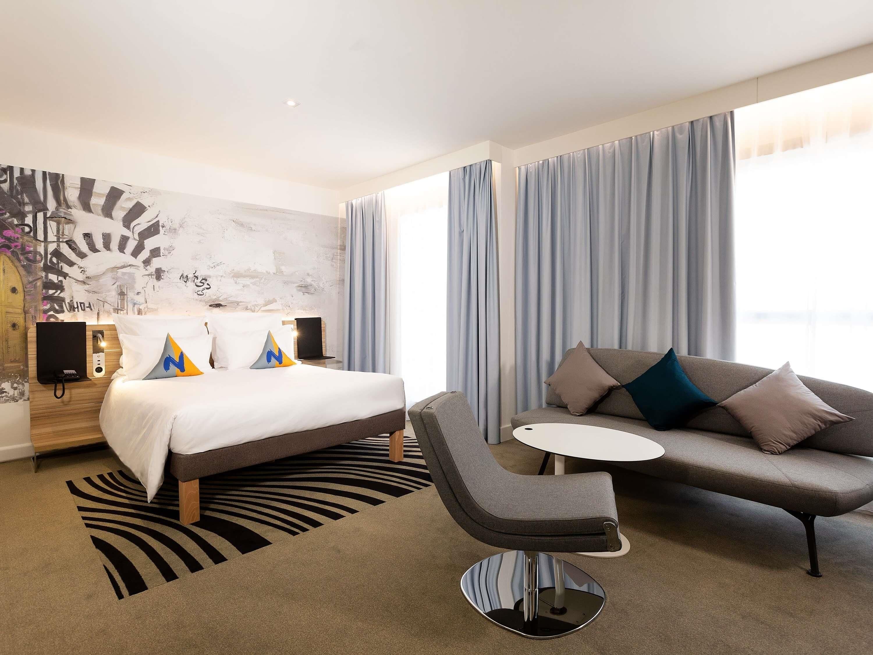 Hypo-allergenic bedding, minibar, in-room safe, desk