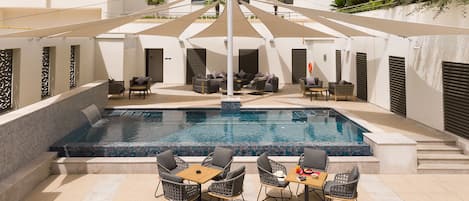 Outdoor pool, open 9:00 AM to 5:00 PM, sun loungers