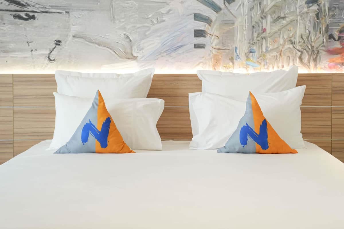 1 habitación, ropa de cama hipoalergénica y minibar