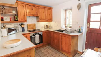 Cottage | Cucina privata | Frigorifero, pentole/stoviglie/utensili