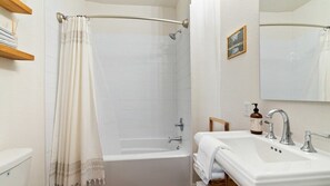 Bathtub, free toiletries, hair dryer, towels