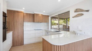 Fridge, microwave, oven, stovetop - Kingsview - 1/54 Kingfisher Drive (PEREGIAN BEACH)