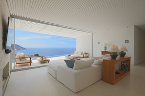 Smart TV, chimenea, futbolito, mesa de ping pong