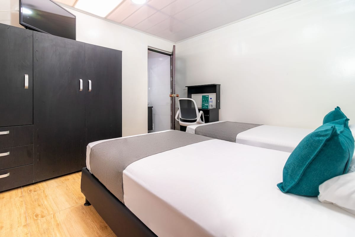 Hypo-allergenic bedding, desk, laptop workspace, free WiFi