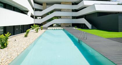 Cosy apartment for 6 guests with A/C, WIFI, pool, TV, terrace and pets allowed