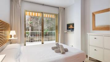 2 dormitorios, tabla de planchar con plancha, Internet y ropa de cama