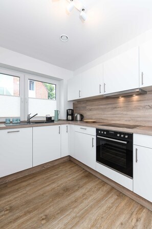 Fridge, oven, dishwasher, high chair