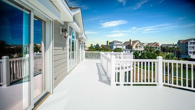 Beautiful home with open porches overlooking lagoon in Wild Dunes