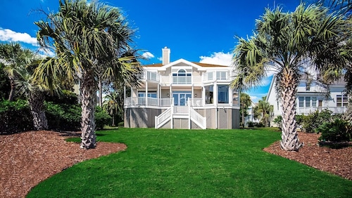 Beautiful home with open porches overlooking lagoon in Wild Dunes