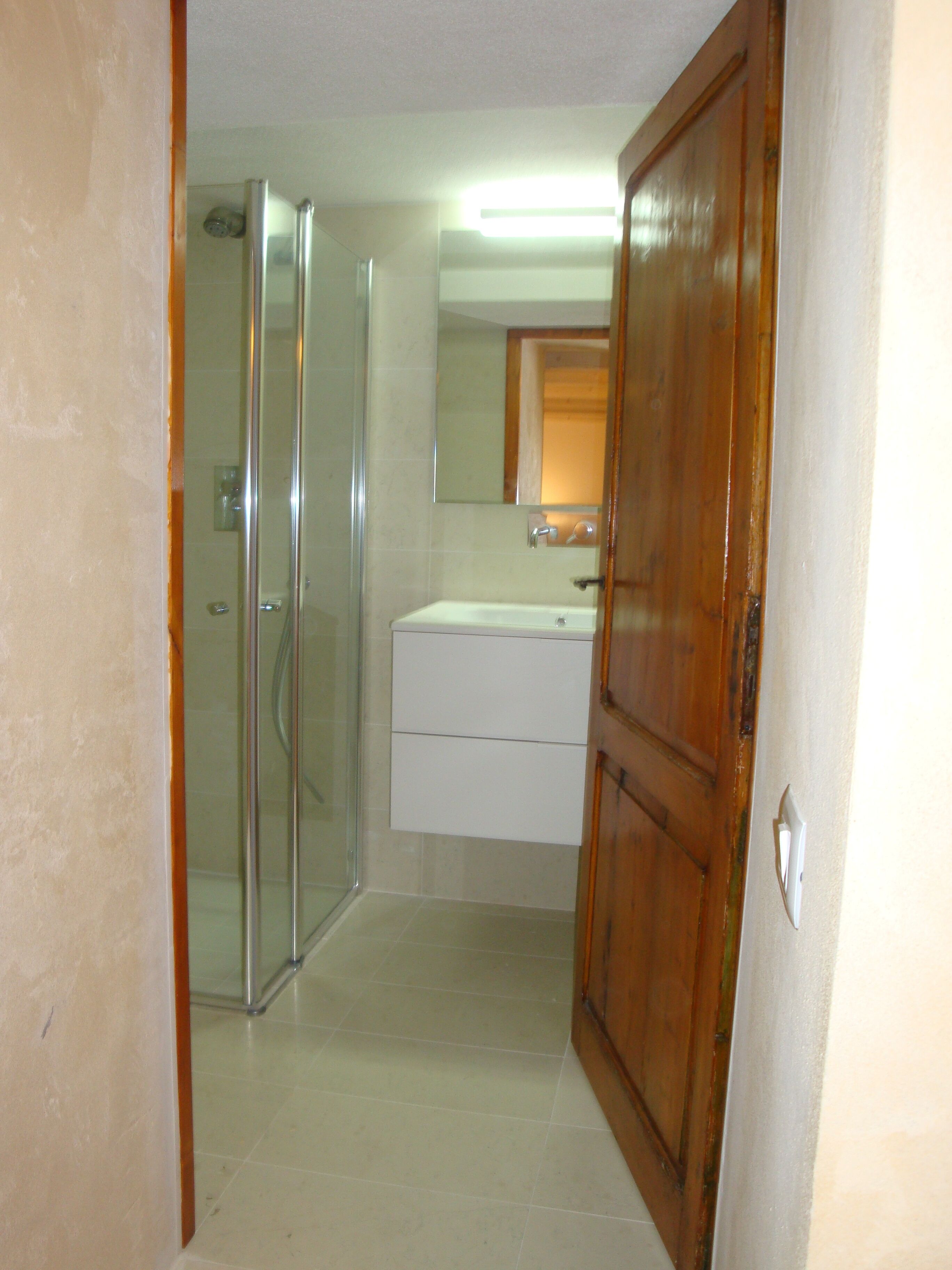 Shower, hair dryer, towels, toilet paper