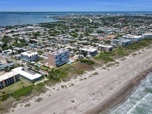 On the beach, beach towels -  RIGHT ON THE BEACH!!  Rockets and Cruise Ships! Kid and pet friendly, 2Br.   (Cocoa Beach)