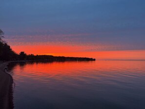 On the beach, sun-loungers, beach towels