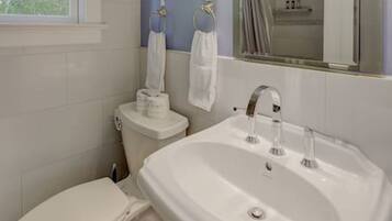 Hair dryer, towels, soap, shampoo