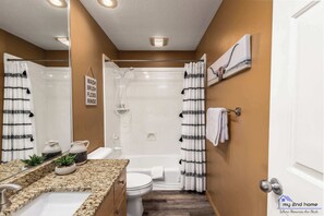 Combined shower/tub, hair dryer