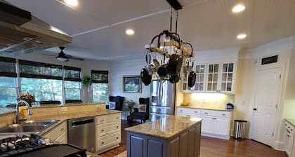 Live in a mansion near the city, offering a resort-style setup.
