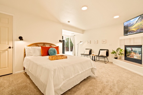 The queen sized bed is comfy, and cozily fits 2 people.