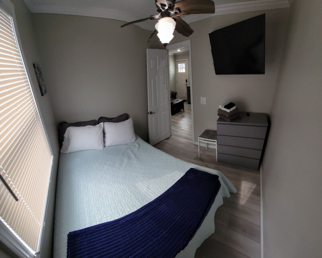 2 bedrooms, desk, iron/ironing board, travel cot