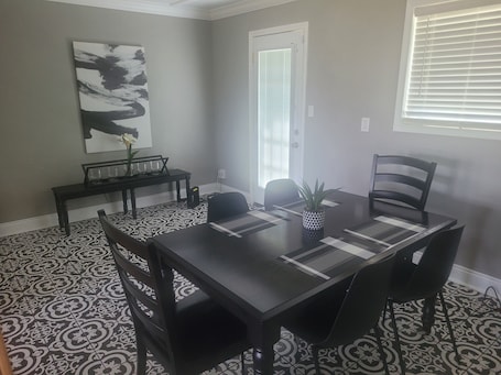 Dining. The Bleu- Furnished Home Near MVSU for Work Crews/Extended Stays