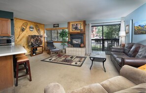 Flat-screen TV, fireplace