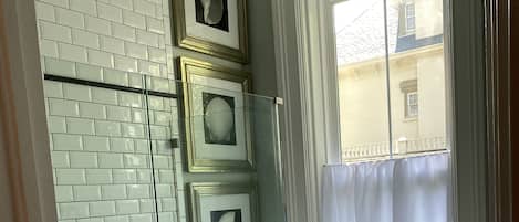 Shower, hair dryer, towels, soap
