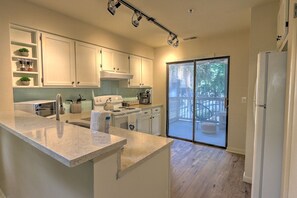 Fridge, microwave, oven, stovetop - Walk to the Beach from this New Bright 2BR/2B condo in the <3 of The Island (Hilton Head Island)