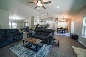 Smart TV, fireplace, books, stereo