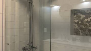 Combined shower/tub, hair dryer, towels, soap