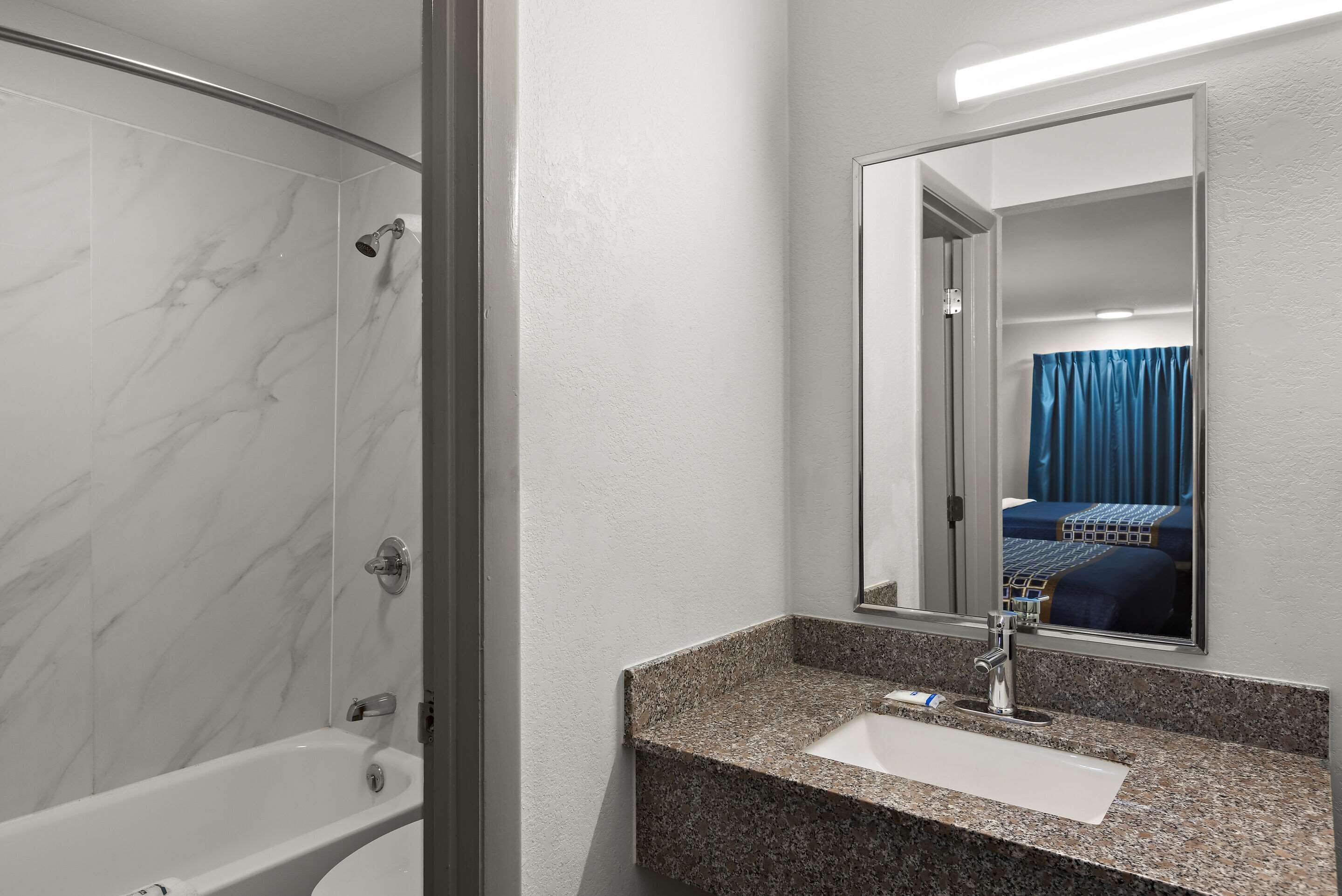 Premium bedding, desk, blackout drapes, soundproofing