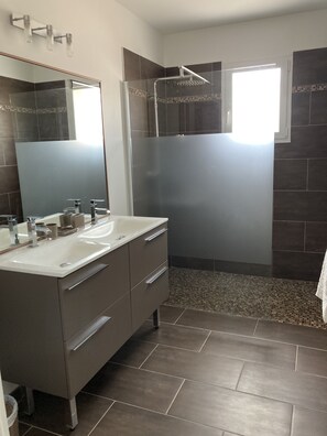 Shower, hair dryer, towels, soap