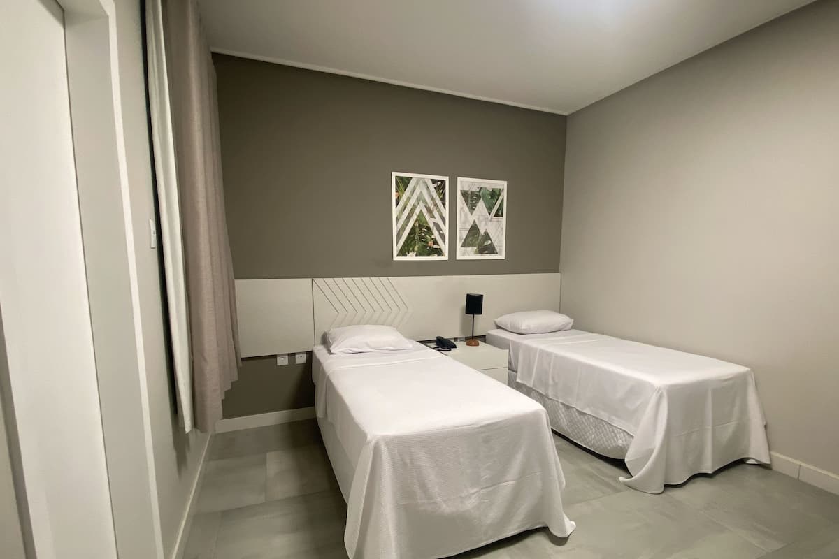 Colchones con pillow-top, minibar y espacio para trabajar con laptop