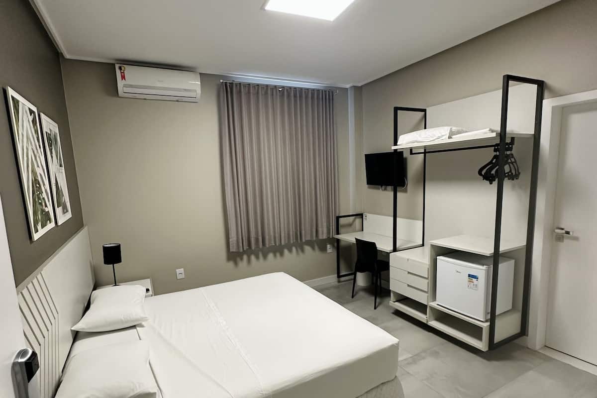 Colchones con pillow-top, minibar y espacio para trabajar con laptop