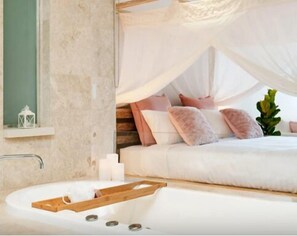 Shower, rainfall showerhead, hair dryer, towels